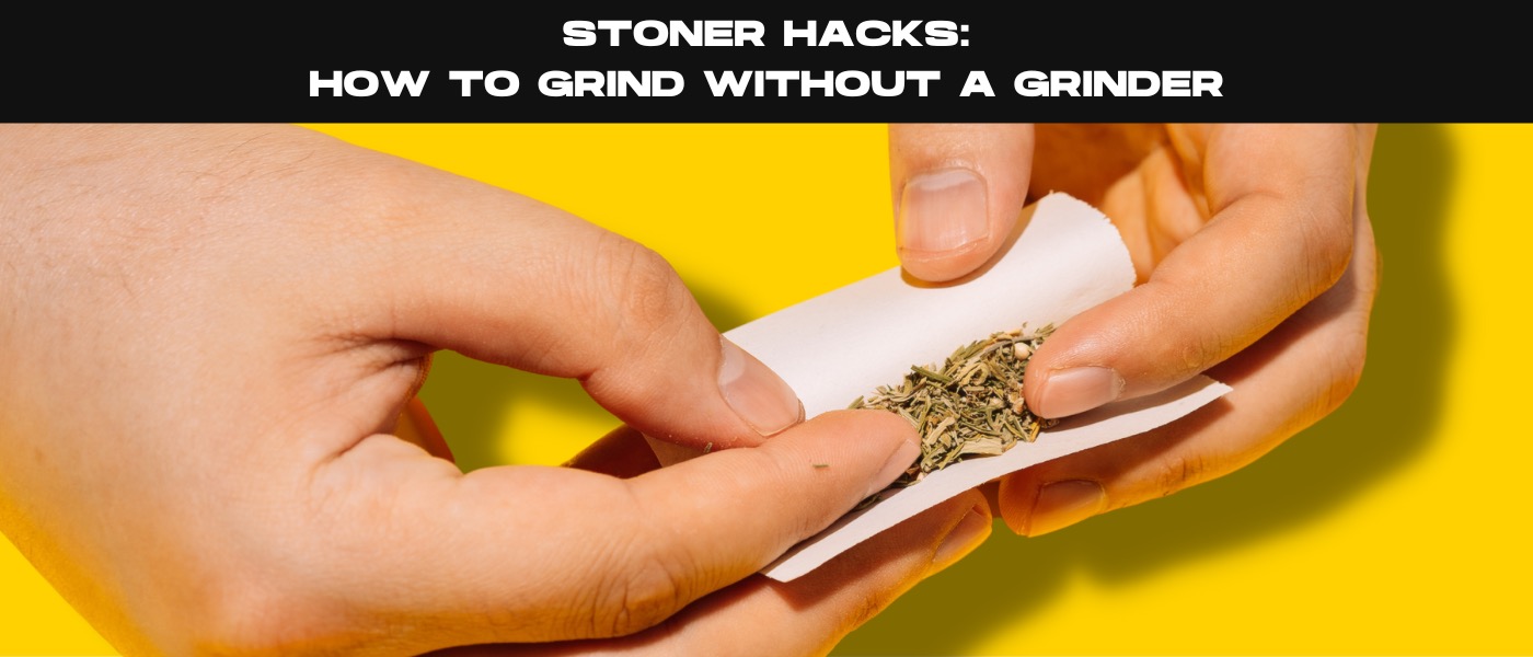 a person holding a cigarette in their hands.